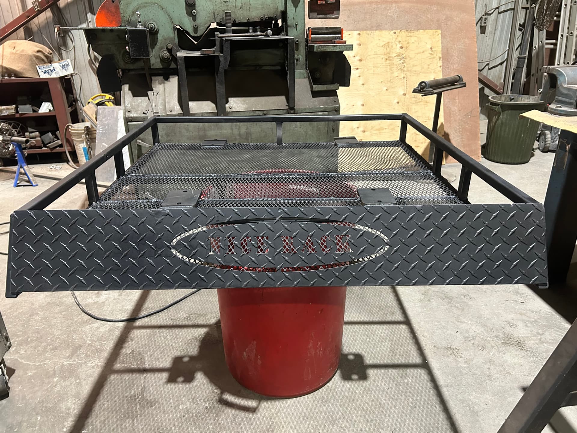 Custom truck roof rack with diamond plate in the shop